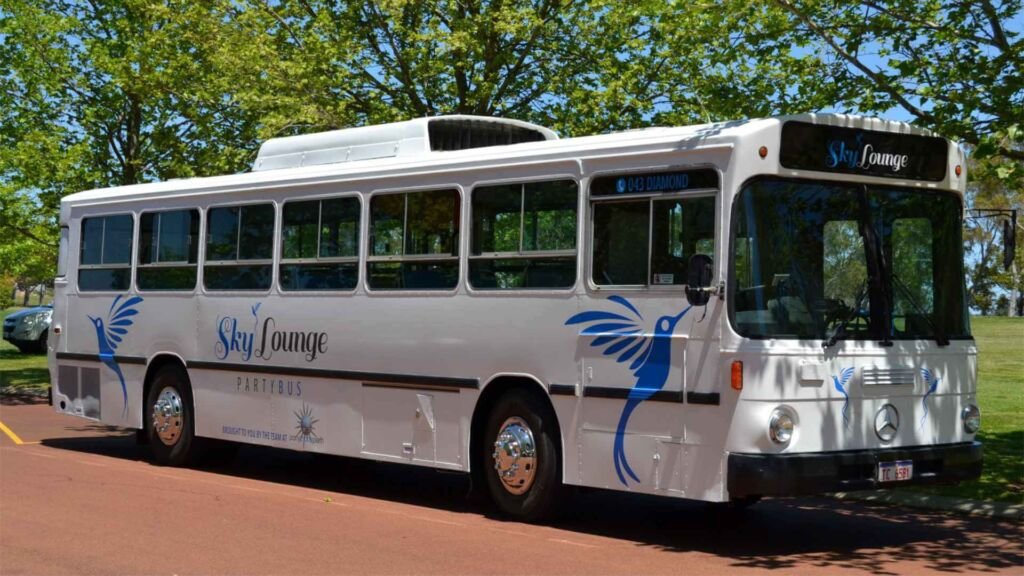 The exterior of Party Charter Perth's Sky Lounge, a 37-seater white blue party bus.