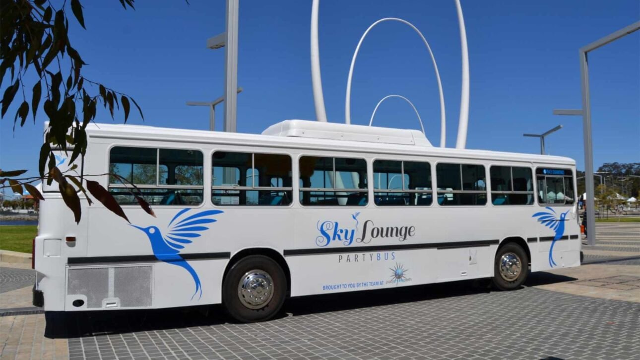 The exterior of Party Charter Perth's Sky Lounge, a 37-seater white blue party bus.