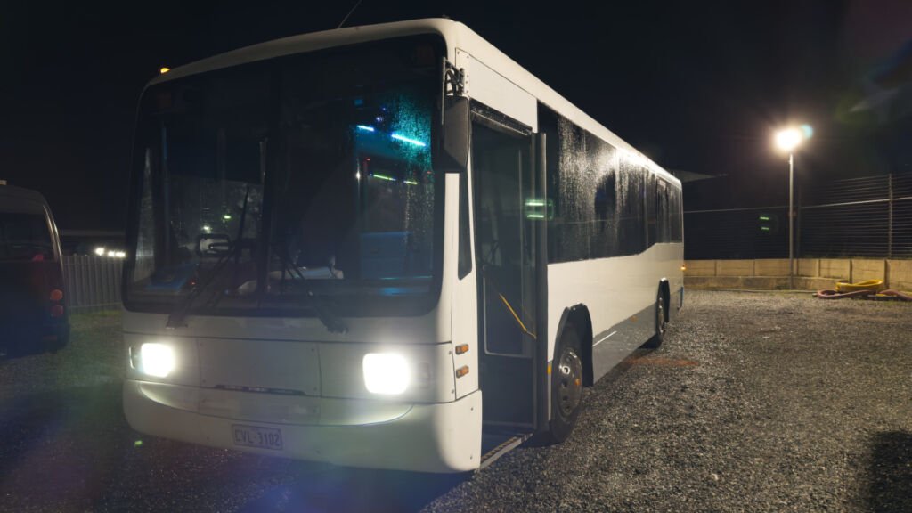 The exterior of Party Charter Perth's Koala Party Bus, a 50-seater white party bus.